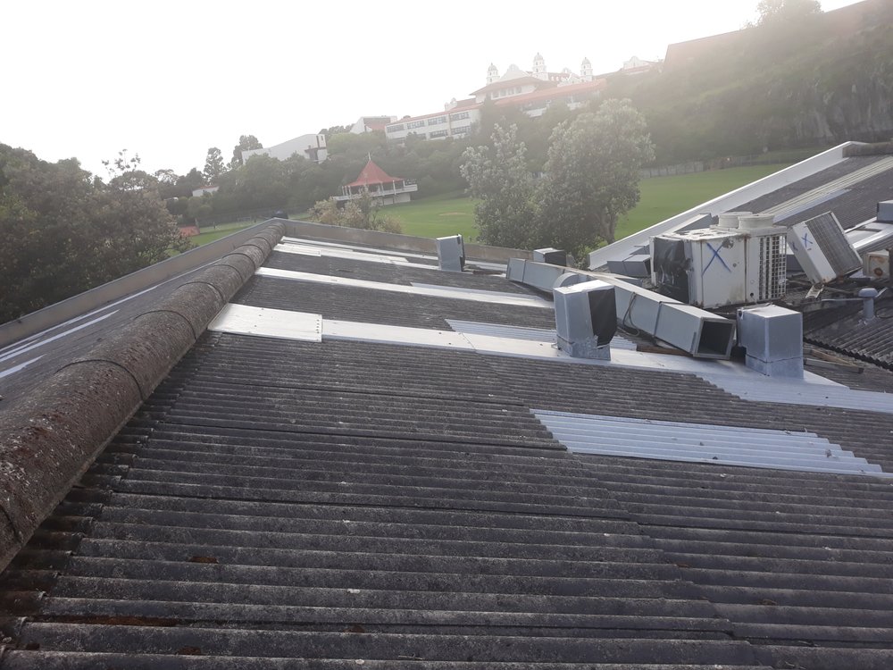 Commercial roof repair in progress